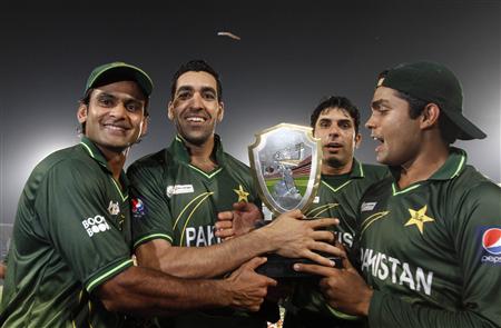 Pakistan's cricket players celebrate after winning the final match against Bangladesh at the Asia Cup Cricket Tournament in Dhaka